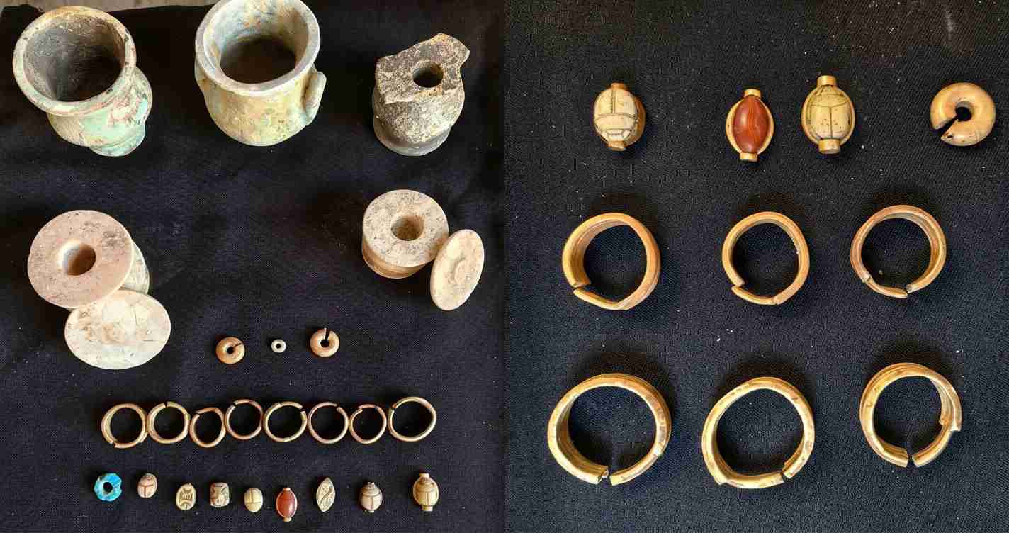 Collection of ancient pottery fragments, small beads, and ring-shaped artifacts arranged on dark fabric in two panels (left with vases and spools; right with circular rings).