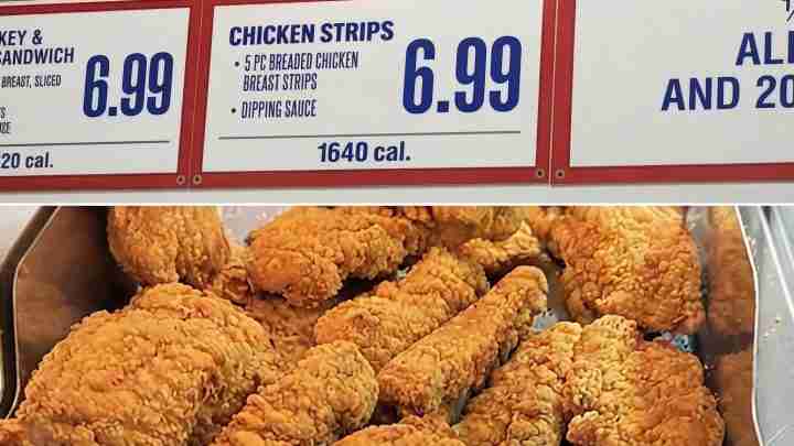 Cripsy fried chicken pieces in a display case with menu boards showing chicken strips for $6.99 and 1640 cal.