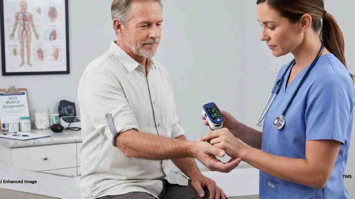 Nurse in blue scrubs checks a man's vital signs with a handheld medical device in a clinic setting.
